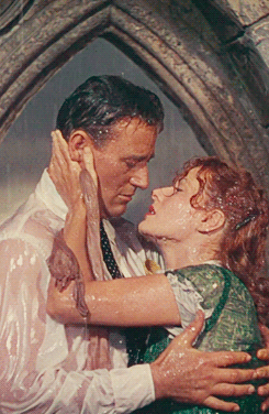 john wayne kissing rain GIF