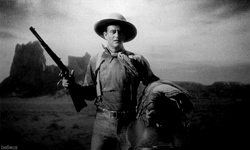 john wayne gun twirl GIF