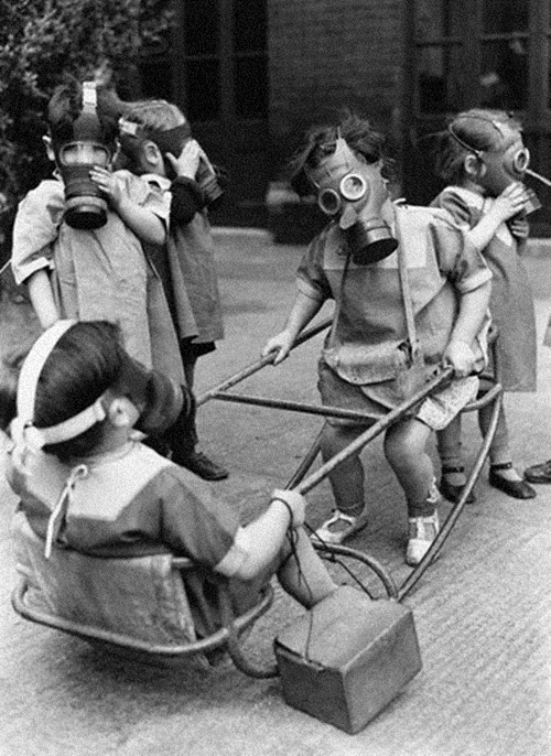 Children Play Wearing Gas Masks