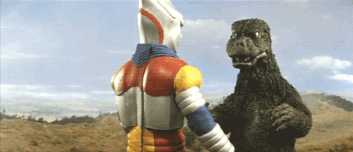 godzilla shaking hands GIF