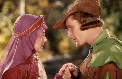 errol robin hood kiss GIF