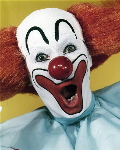 ** FILE ** In this undated file photo, promoter and entertainer Larry Harmon portrays Bozo the Clown.  Harmon, who appeared as Bozo the Clown for decades and licensed the name to other Bozos around the world, had died at age 83. He died Thursday, July 3, 2008, at his home of congestive heart failure,according to his longtime publicist, Jerry Digney. (AP Photo/International Clown Hall of Fame, file) ** NO SALES **