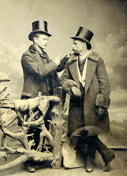 men togetehr top hats stache