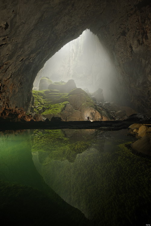 VIETNAM - MAY 01:  A rock formation shines beneath a skylight in Hang Son Doong.  (Photo by Carsten Peter/National Geographic/Getty Images)