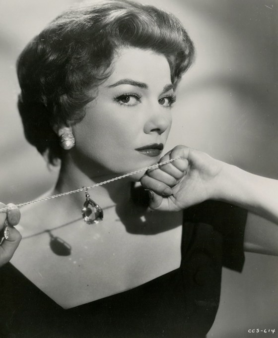 Anne Baxter in a publicity photograph for “Chase a Crooked Shadow” (1958)