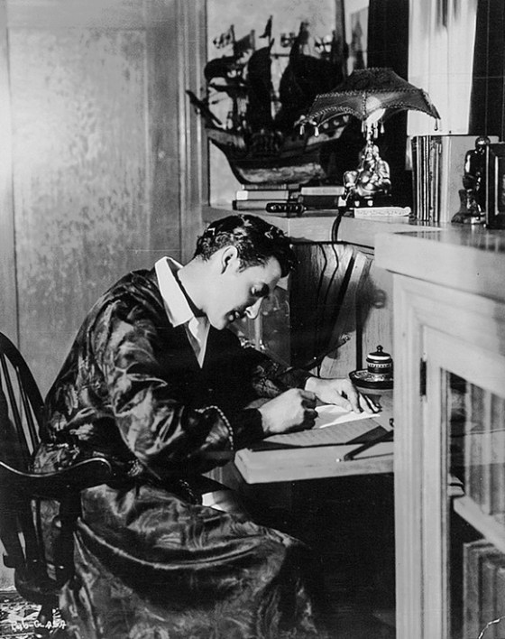 John Gilbert at his writing desk, 1926