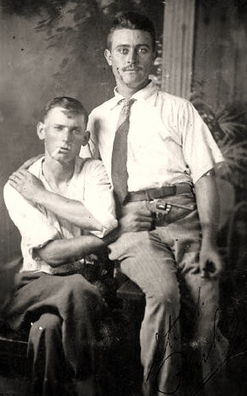 05-21-14 Strange photo from the '30s. Note the gun.