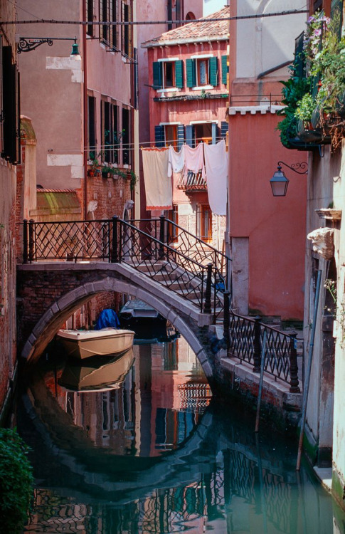 Venice, boat in a small canal
