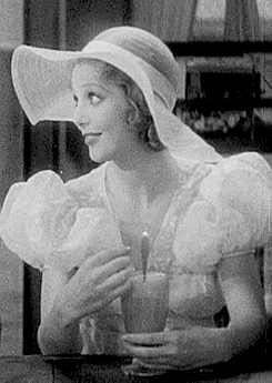 loretta-young-enjoys-a-milkshake-in-they-call-it-sin-1932