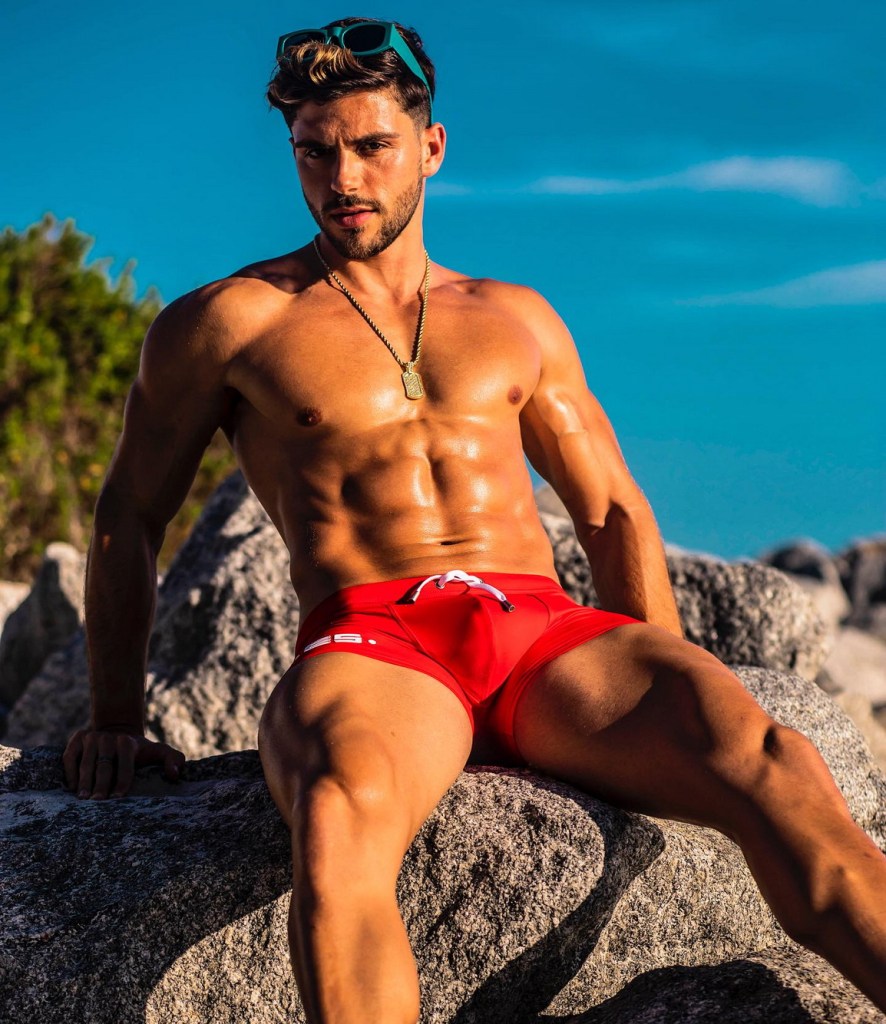 MODEL WEARING RED&nbsp;SWIMWEAR
